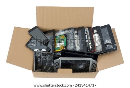 Cardboard box with the r broken  phones and tablets. Isolated on white [[stock_photo]] © 