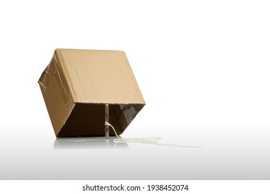 Cardboard Box With Stick As Trap Isolated On White With Copy Space