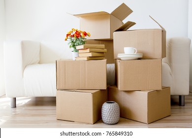 Cardboard boxes - moving to a new house - Shutterstock ID 765849310
