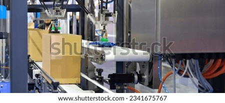 Cardboard boxes on conveyor belt.parcels transportation system concept