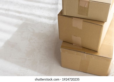 Cardboard Boxes Piled Up In The Room. Moving Image 