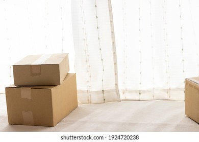 Cardboard Boxes Piled Up In The Room. Moving Image 