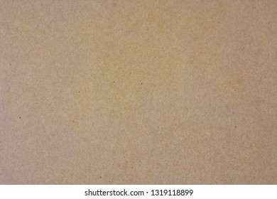 Cardboard carton craft background.
Brown paper Kraft recycle texture. 
Grunge old paper card light and shadow.
top view. - Shutterstock ID 1319118899