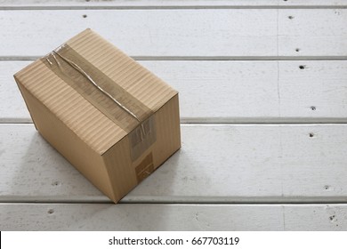 Cardboard Delivery Parcel Box Delivered To Doorstep Closeup