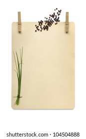 Cardboard Hanging From Clothespegs, Isolated On White, With Peppercorns And Chives.  Food Background With Lots Of Copy Space For Any Message Or Recipe.