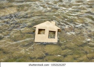 Cardboard House By The Sea. Homeless Child. Refugee Problem. Concept Of Finding A Better Life.