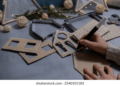 Cardboard House Gift Christmas idea. Do it yourself instruction eco-friendly decoration. Zero waste Making handmade presents children's diy projects. Holiday family time - Powered by Shutterstock