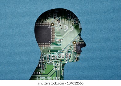 Cardboard human head cutout revealing circuit board content - Powered by Shutterstock - Get 15% off with code: PIKWIZARD15