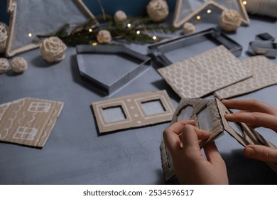 Cardboard Lantern handmade house Storytelling creating craft Christmas holiday decoration. Tactile hand-on activity. Master class progress of creative me-made gifts. Seasonal domestic life micro - Powered by Shutterstock