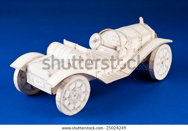 Cardboard model of an early
car