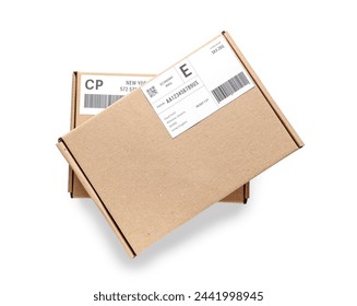 Cardboard packages with shipping labels and barcodes on white background - Powered by Shutterstock