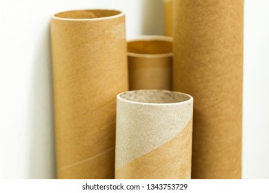 Cardboard Postage Tubes Standing Up Straight.