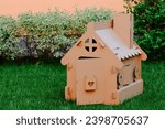 Cardboard toy house for children. Eco-friendly Box for pet or carton playhouse