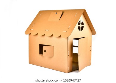 Cardboard toy house for children on white background. Eco-friendly Box for pet or carton playhouse