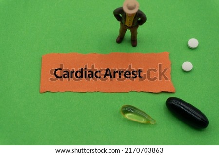 Cardiac Arrest.The word is written on a slip of colored paper. health terms, health care words, medical terminology. wellness Buzzwords. disease acronyms.