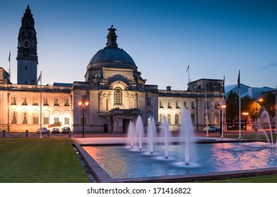Cardiff City Hall (1906) and fountains at night in the heart of the capital, city Museum to the right.