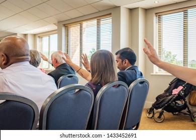 Cardiff, UK. 29th June 2019. Christians Lift Their Hands In Prayer At A Church Service.