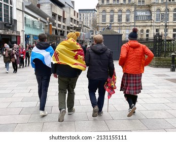 Cardiff, Wales - February 2022: Scottish rugby fans walking through Cardiff city centre before the start of a Wales rugby international match