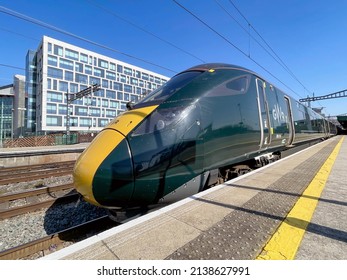 Cardiff, Wales - March 2022: Wide angle view of a Class 800 high speed train operated by Great Western railway at one of the platforms of Cardiff Central railway station.