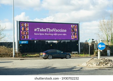 Cardiff, Wales, UK - 02.22.2021: A Billboard That's Persuading The Public To Take The Vaccine, In Terms Of Covid-19 (Coronavirus).