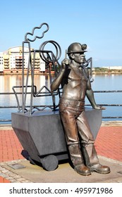 Cardiff, Wales, UK, September 14, 2016 :  From Pit To Port Sculpture By John Clinch And Unveiled In 2005 Which Overlooks The Roath Basin In Cardiff Bay Celebrating Welsh Coal Miners