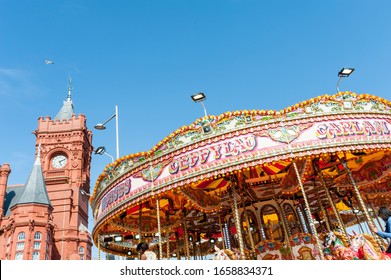 Cardiff, Wales / United Kingdom - June 14 2017: Pierced building and carousel in Cardiff Bay, Cardiff