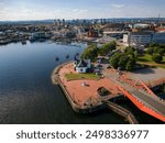 CARDIFF,WALES - JULY 29 2024: Aerial view of the Norwegian Church, Welsh Government, Pierhead and other landmarks in Cardiff Bay