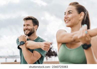 Cardio endurance exercises, use a fitness watch and an app. Runners athletes in fitness clothes. Motivation for the doric lifestyle.  - Shutterstock ID 2360725083