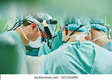 Cardio Surgery Operating Room. Male Cardiac Surgeon In Hospital