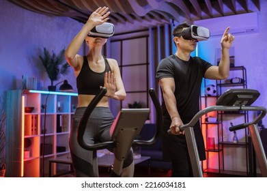 Cardio training, exercise machines, exercising legs, cardio workout indoors, 3D reality concept, young multinational couple training on exercise machines in virtual glasses. - Powered by Shutterstock