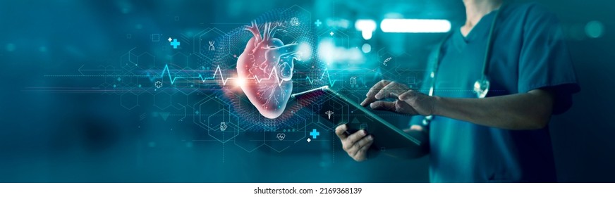 Cardiologist doctor examine heart functions and check up report electronic medical record of patient on tablet. Digital healthcare and network connection on interface, Science. Medical technology. - Shutterstock ID 2169368139