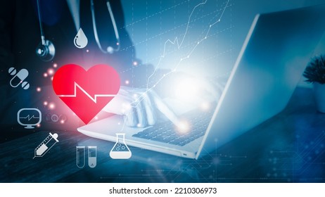 Cardiologist Doctor Examine Patient Of Cardiovascular System With Notebook (Laptop). Medical Technology And Heart Functions And Blood Vessel Concept. Healthcare Treatment To Diagnose Heart Disorders.