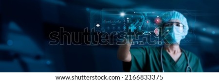 Cardiologist Doctor, Surgeon analyzing patient heart testing result and human anatomy on digital futuristic virtual interface, Digital holographic, AI, Technology, innovation in science and medicine.