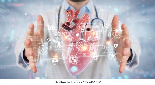 Cardiologist On Blurred Background Using Digital X-ray Of Human Heart Holographic Scan Projection 3D Rendering