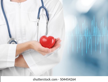 Cardiologist With Red Heart. Cardiology Concept.