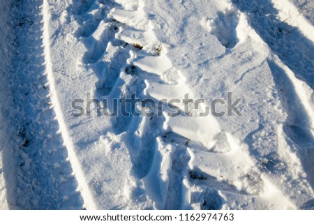 Similar – snow tracks Winter Ice