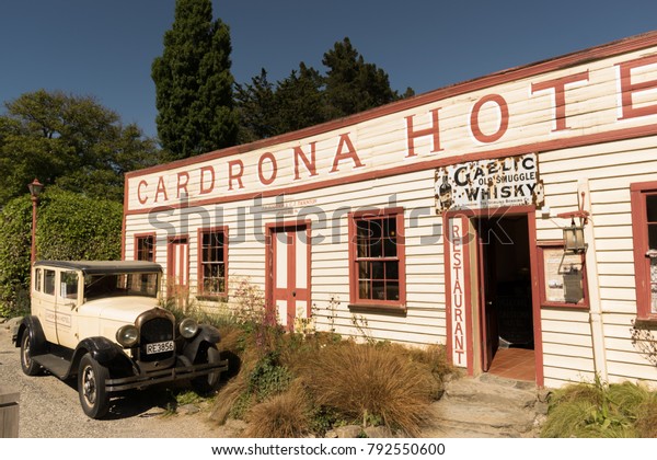 CARDRONA,\
NEW ZEALAND, NOV 2017 - Vintage car parked in front of the Cardron\
Hotel,  New Zealand\'s oldest pub (Est. in\
1865)