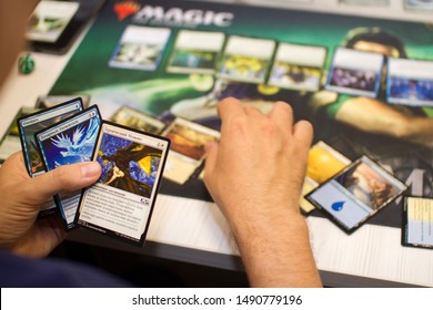 Cards of board game Magic The Gathering are on the table. New expansion game. man playing cards. Blagoveshensk, Russia - july 14, 2019