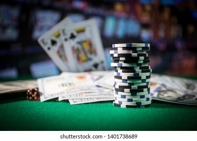 Cards And Chips On Green Felt Casino Table. Abstract Background With Copy Space. Gambling, Poker, Casino And Cards Games Theme. Casino Elements On Green. Selective Focus