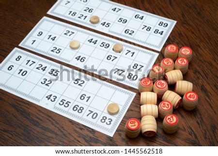 cards and kegs for lotto game on the wooden table