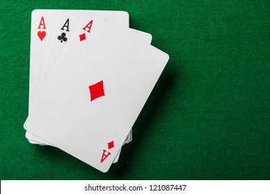 Cards And Pack Of Playing Cards On The Table.