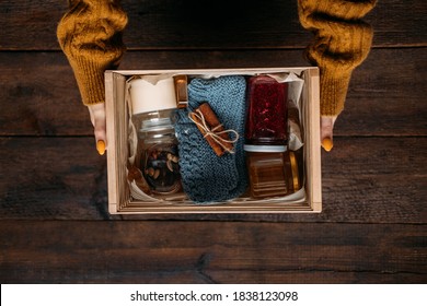 Care box, package ideas. Fall or Winter care box with sweets and warm clothes. Care Package Delivery, Fall Winter holidays Food Care gift box