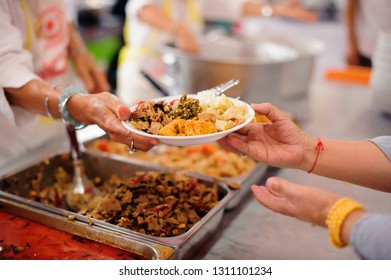 Care and care for homeless people - help with food donations - Shutterstock ID 1311101234