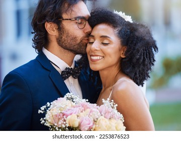 Care, kiss and couple at wedding happy with romantic outdoor marriage event celebration with flowers. Partnership, commitment and trust embrace of interracial bride and groom with excited smile. - Shutterstock ID 2253876523