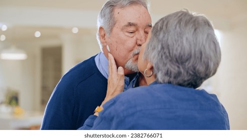 Care, love or old couple kiss in home to relax for connection, support, bond for trust or comfort. Elderly people in marriage, house or retirement with commitment, affection or romance together - Powered by Shutterstock