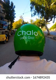 A Careem Bike Rider In The City Of Karachi. Ride Hailing Services Have Become Backbone In The Absence Of Good Public Transportation System - Sindh Pakistan - Mar 2020