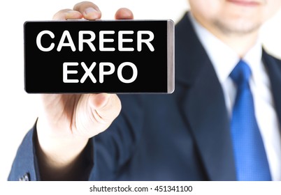 CAREER EXPO Word On Mobile Phone Screen In Blurred Young Businessman Hand Over White Background, Business Concept