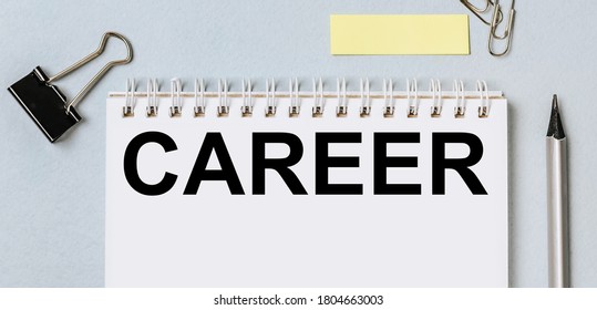CAREER. Flat layout of office workplace with stationery. Blank stickers with place for text, pencils, notebook, binder clips and pushpins isolated on white and blue background. Office supplies set.
