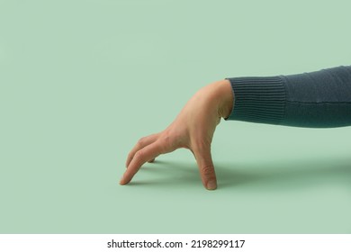 Career Hand On A Mint Green Background. Minimal Concept For Corporate, Deal, Employment Agreement, Executive. Decision Maker.