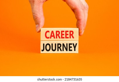 Career journey symbol. Concept words Career journey on wooden blocks on a beautiful orange table orange background. Businessman hand. Business Career journey concept. Copy space.